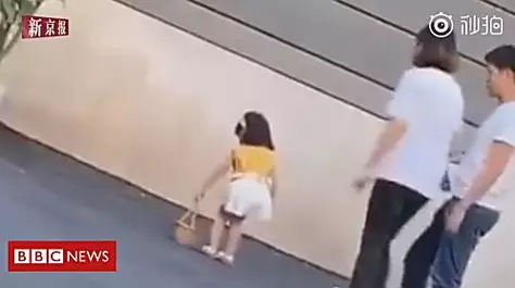 Social outcry over video of mum kicking girl