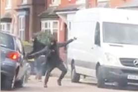 WATCH: Shocking moment balaclava-clad men attack a driver with a MACHETE