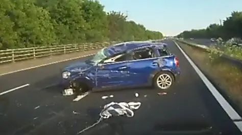 Car flips on roof in 101mph road rage row