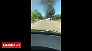 Aircraft crashes on to main road