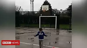 Boy, 6, kicks rugby ball into basketball hoop