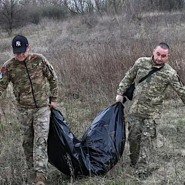 The Ukrainian troops collecting the enemy's dead