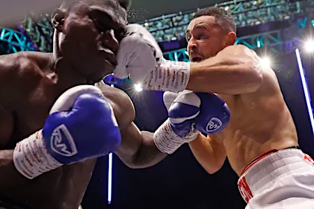 Callum Simpson wins second title fight in three weeks with thrilling stoppage at Wembley Arena