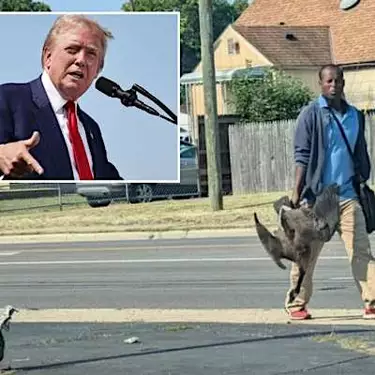 Ohio officials reveal why man in viral photo was holding two geese