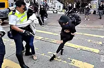 Hong Kong police shoot demonstrator during rush hour protests