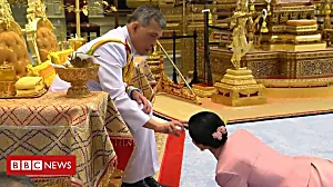 Thai king pours sacred water on queen's head