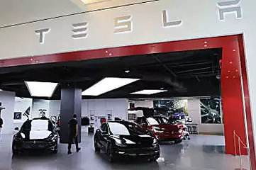 Special delivery! Start investing in companies like Tesla and start earning!