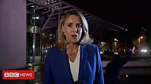 Cyclist falls into water during live news report