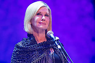 Olivia Newton-John Left Out Of Emmys In Memoriam & Fans Are Furious