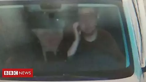 Chinese driver gets ticket for scratching his face