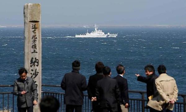 Search on after Japanese island 'disappears'