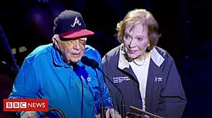 Jimmy Carter attends event with black eye