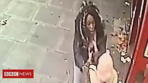 Woman slapped in 'shocking' purse grab