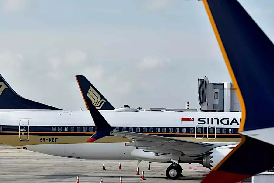 新加坡航空警告稱，儘管年度利潤創歷史新高，但仍面臨貿易逆風