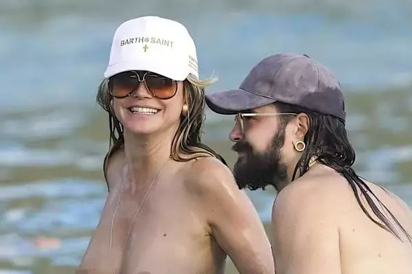 Star, 52, goes topless during beach getaway