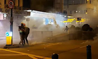 Live updates: Riot police fire tear gas to disperse Hong Kong protesters