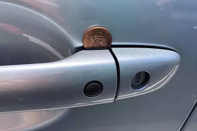 【圖片】如果你在車門把手上看到一枚硬幣，請走開
