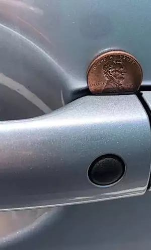 【圖片】如果你在車門把手上看到一枚硬幣，請走開