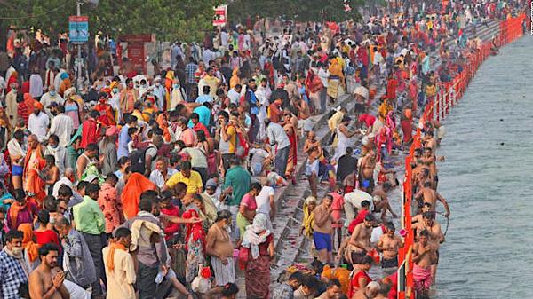 Millions of Hindu pilgrims head to Ganges River as India's daily coronavirus cases continue to surge